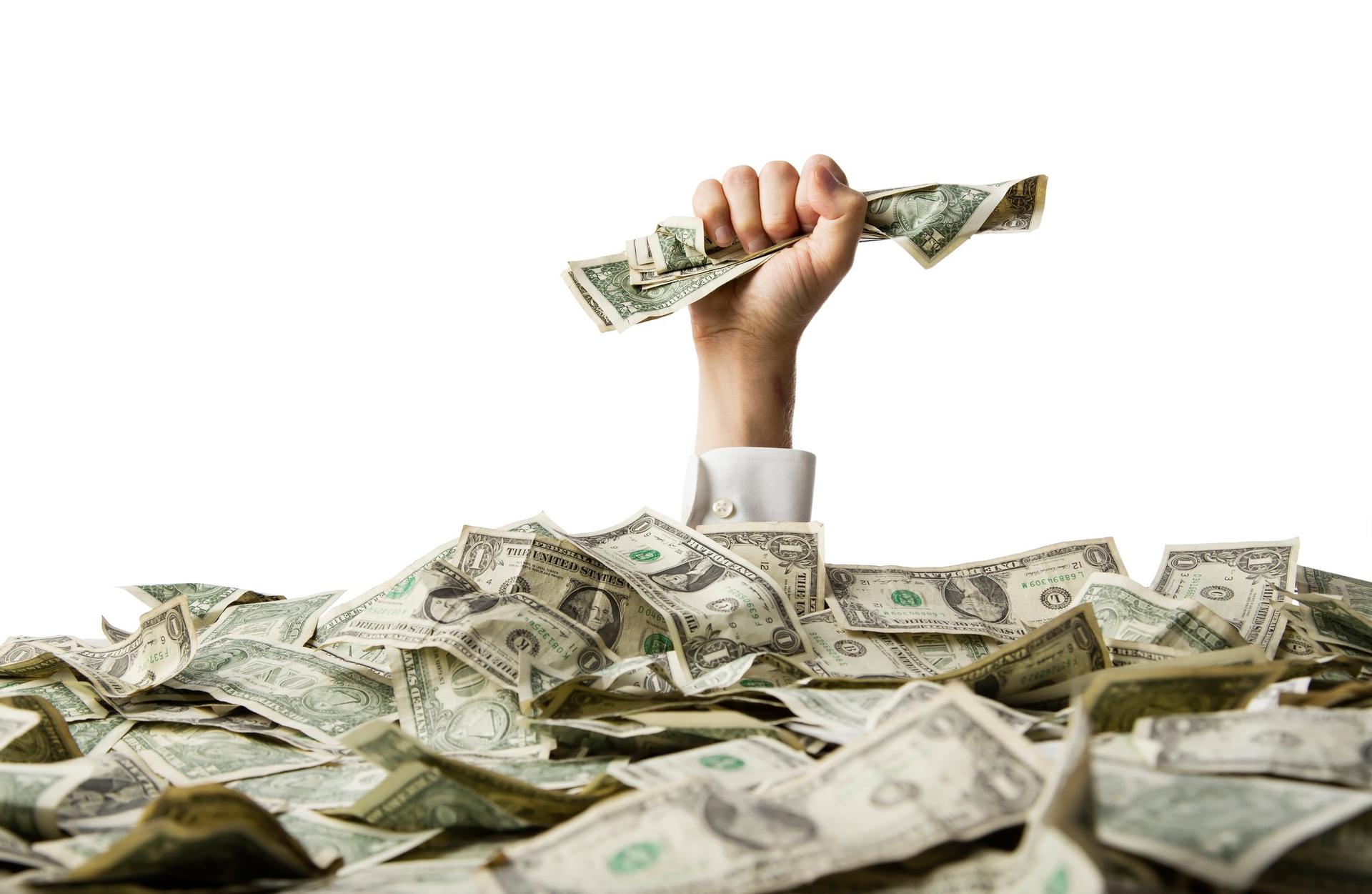 Dinheiro na mão: bancos gostam de flexibibilização de regra na CVM pois tesourarias fazem lucro (Getty Images/Getty Images)