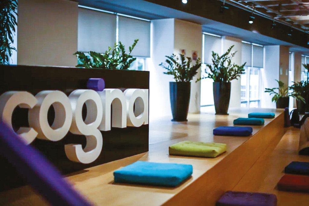 Cogna: empresa de educação está confiante na geração de caixa  (Divulgação/Divulgação)