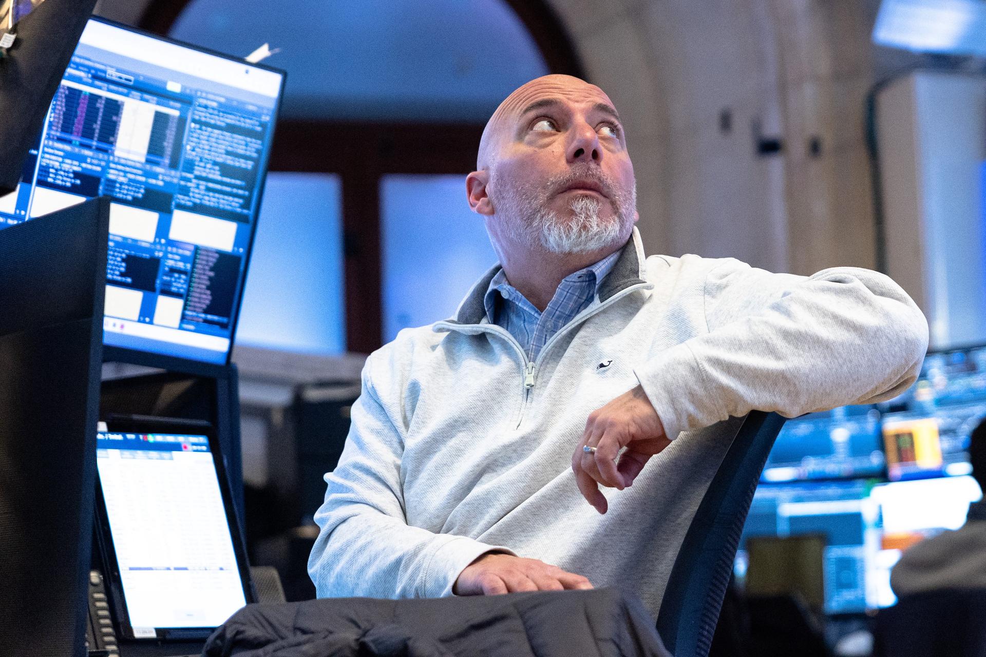 A velocidade da queda dos mercados globais e o aumento da chance de uma recessão prolongada na economia americana vem aumentando os temores de um colapso geral na economia mundial (Getty Images via AFP)